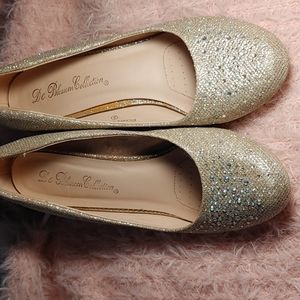 Rose gold shoes with diamonds in the front